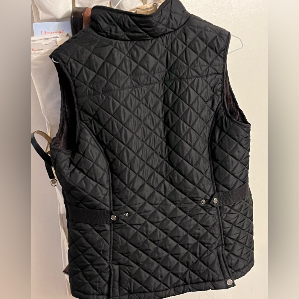 Large woman’s vest for sale rarely used.